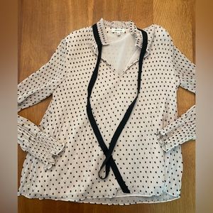 Pale blush pleated blouse with black dots and grosgrain black ribbon tie detail
